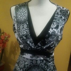 Moa Moa black and white sleeveless shirt.